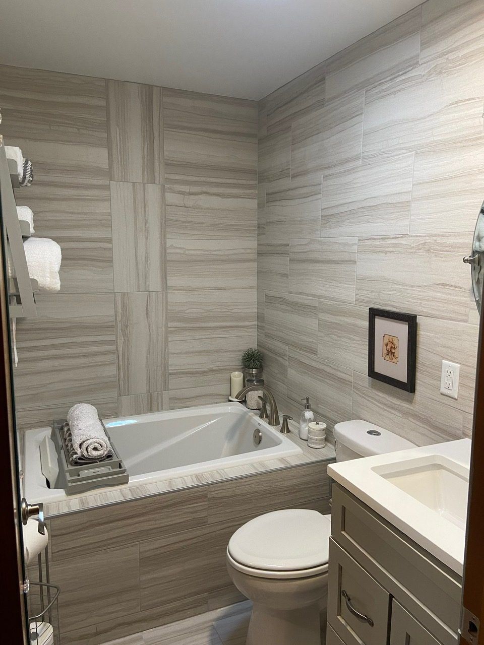 Remodeled bathroom with tiles and tub Luxury remodeled bathroom with tiles and tub